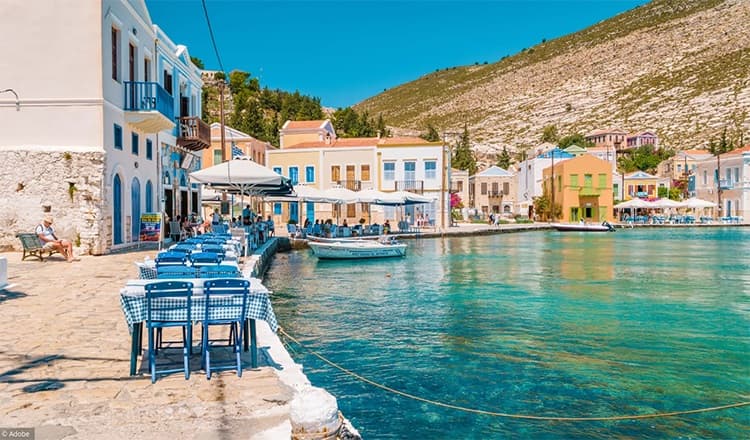 Kastellorizo harbour, colourful houses and calm Aegean — Dodecanese Greece